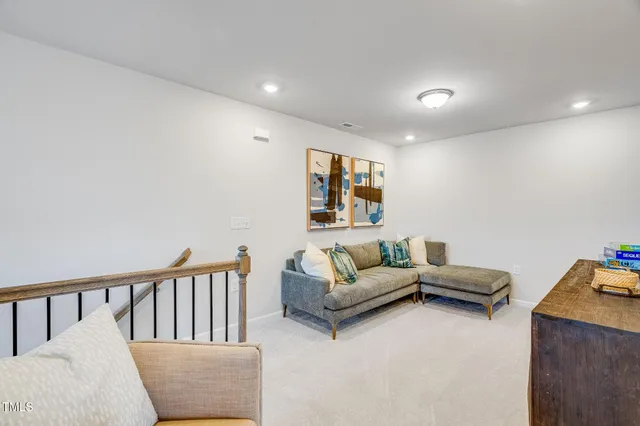 a living room with furniture and a couch