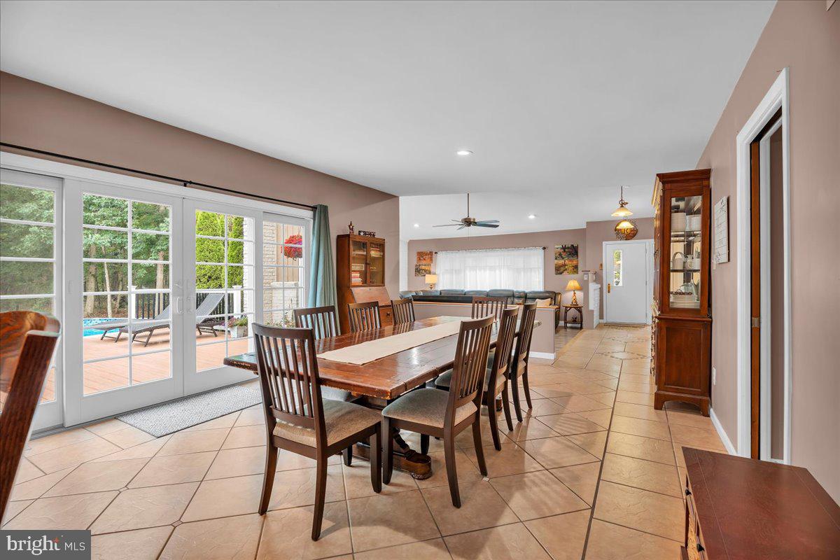 64 Blue Anchor Road Sicklerville, NJ 08081 - Photo 10 of 47 a dining room with furniture and large windows