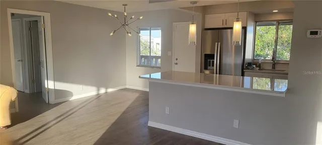 a view of a bathroom with a glass door shower