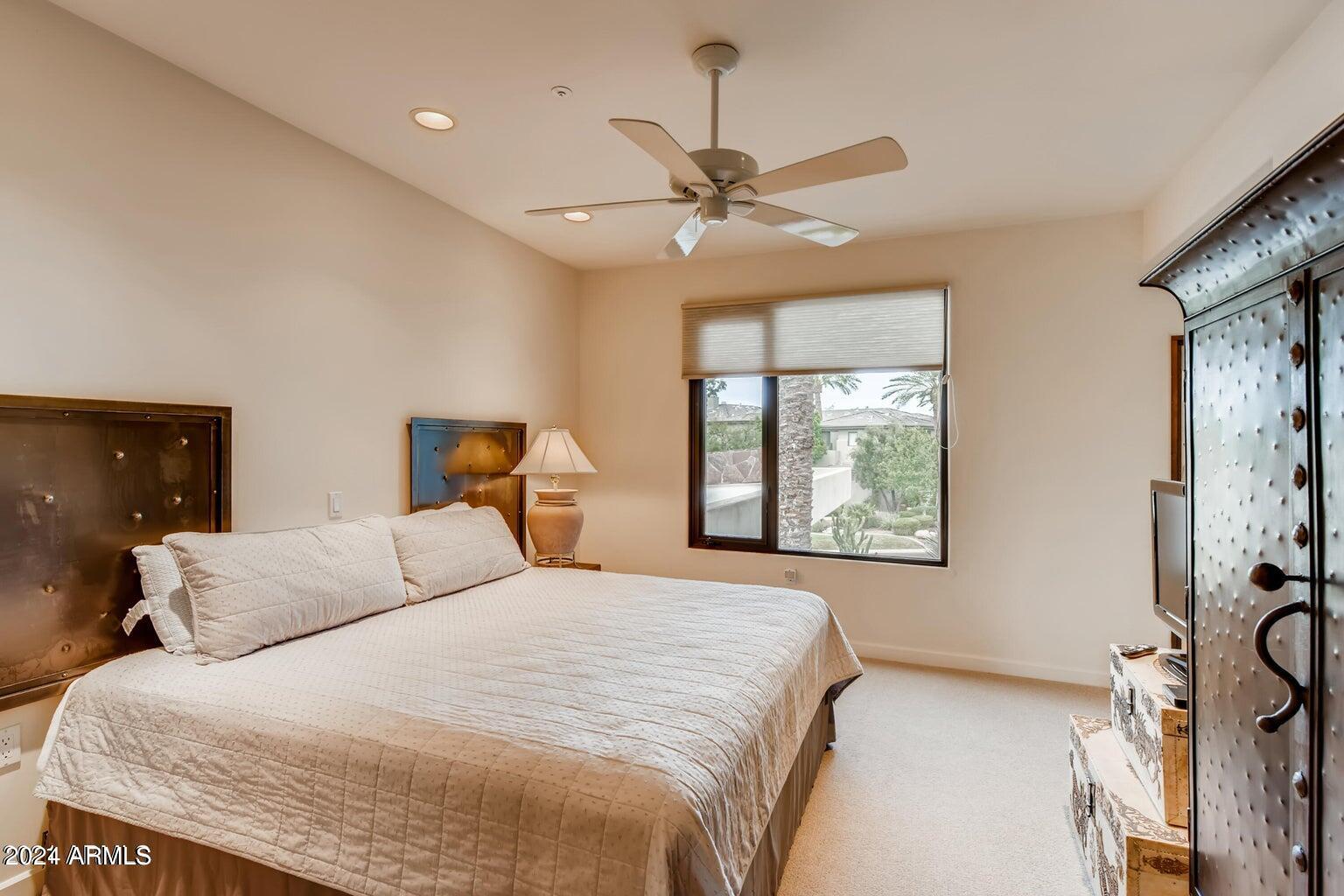 7475 East Gainey Ranch Road, Unit 26 Scottsdale, AZ 85258 - Photo 18 of 25 Bedroom 2 Upstairs