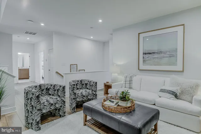 a living room with furniture and a couch