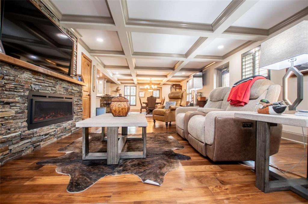 2070 Lovvorn Road Carrollton, GA 30117 - Photo 17 of 98 a living room with lots of furniture and a fireplace