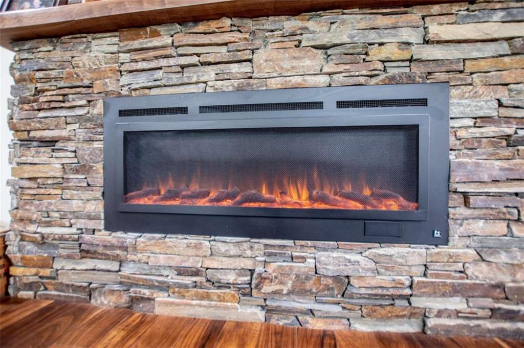 2070 Lovvorn Road Carrollton, GA 30117 - Photo 20 of 98 a fireplace with a clock on wall