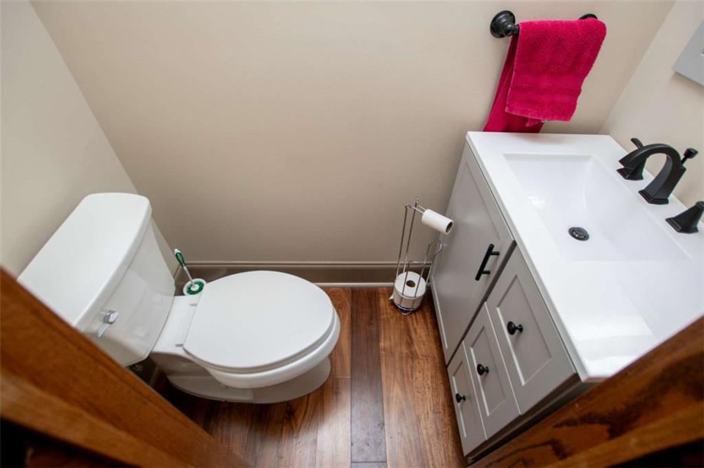 2070 Lovvorn Road Carrollton, GA 30117 - Photo 21 of 98 a bathroom with a toilet and a mirror