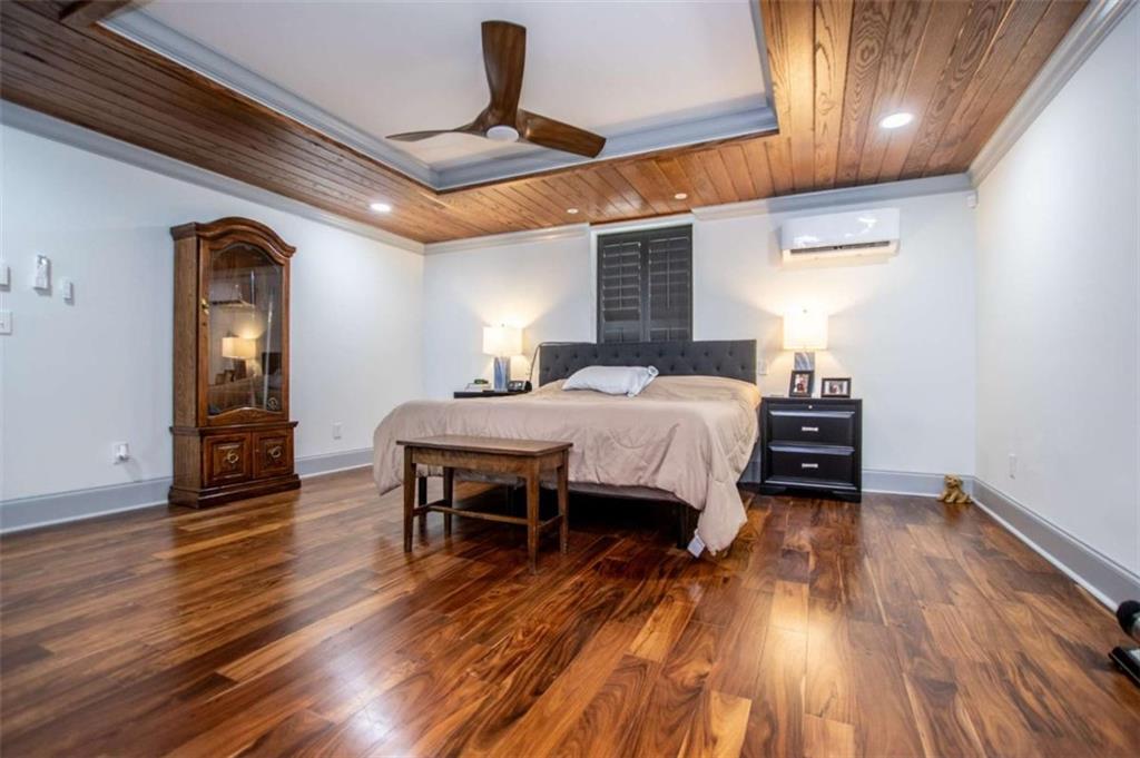 2070 Lovvorn Road Carrollton, GA 30117 - Photo 39 of 98 a bedroom with a bed and a table