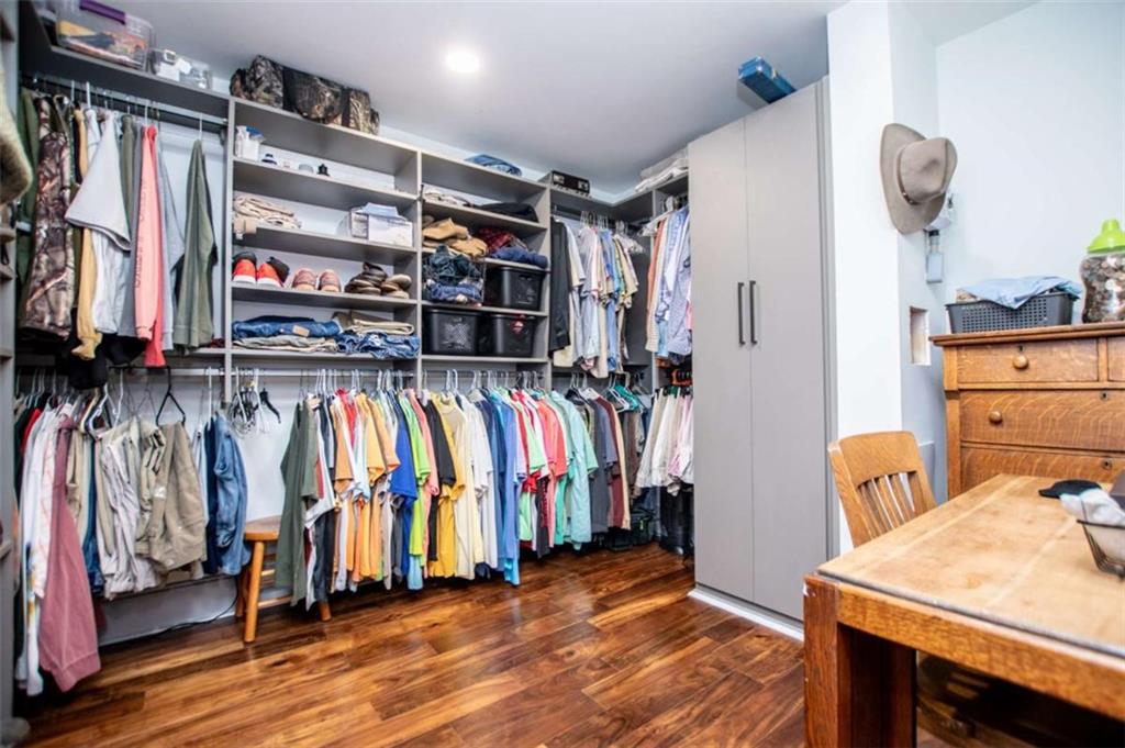 2070 Lovvorn Road Carrollton, GA 30117 - Photo 41 of 98 a view of walk in closet with clothes and shoes