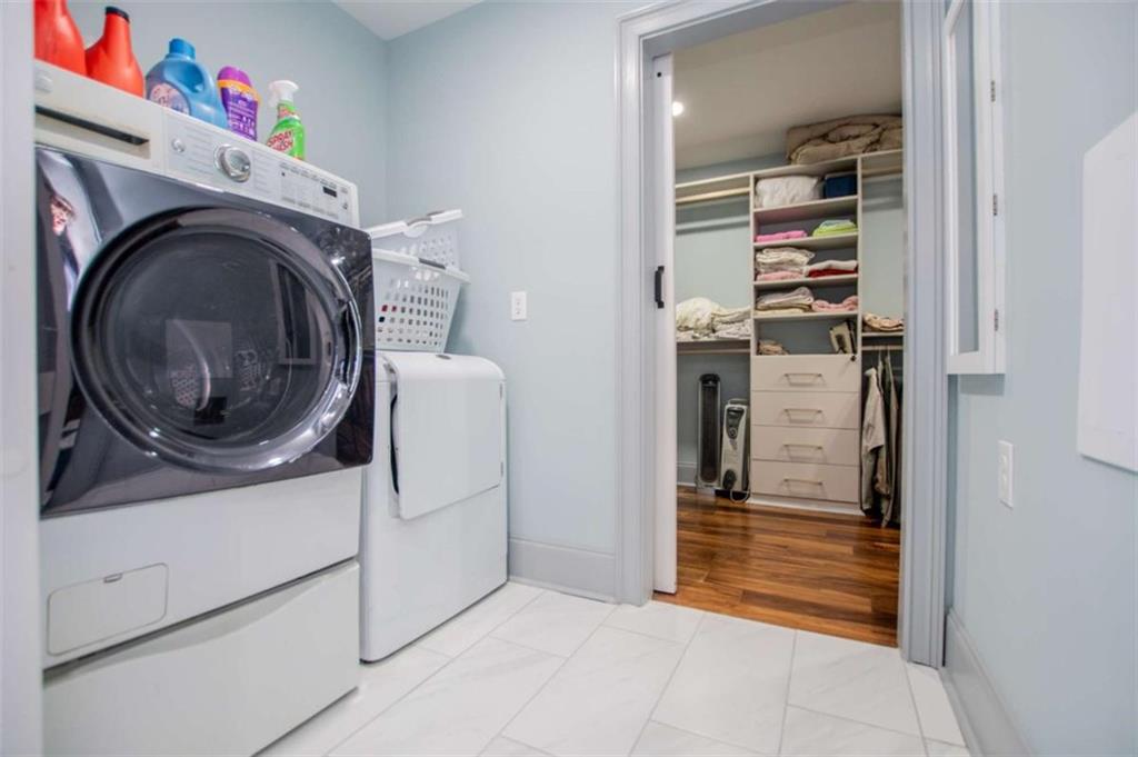 2070 Lovvorn Road Carrollton, GA 30117 - Photo 58 of 98 a utility room with closet dryer and washer