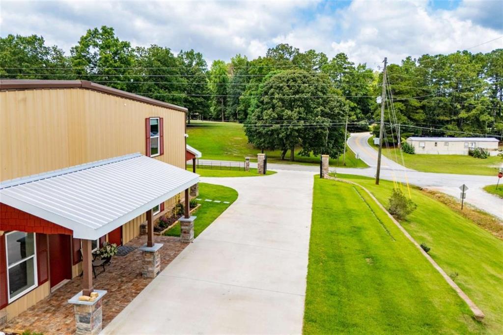 2070 Lovvorn Road Carrollton, GA 30117 - Photo 10 of 98 a view of a backyard with swimming pool