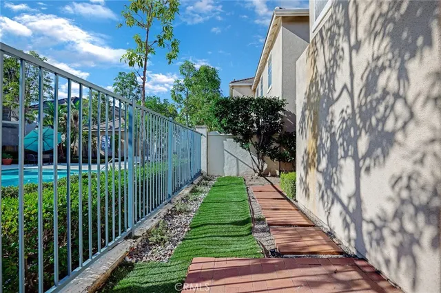 a view of a pathway with a park