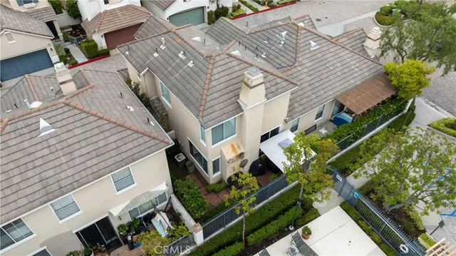 an aerial view of a house with a garden