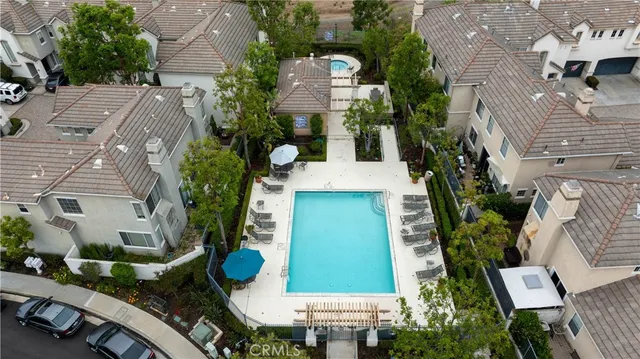 an aerial view of a house with outdoor space and street view