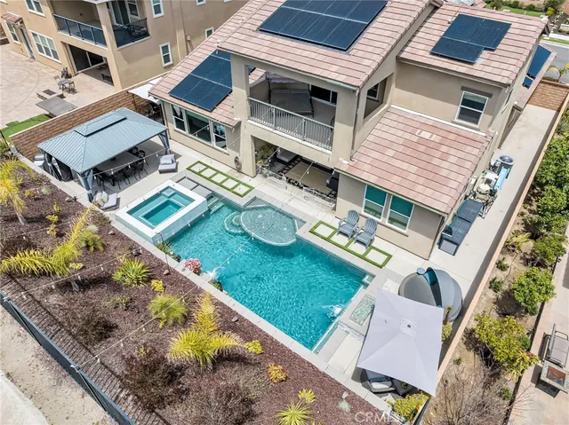 an aerial view of a house with balcony