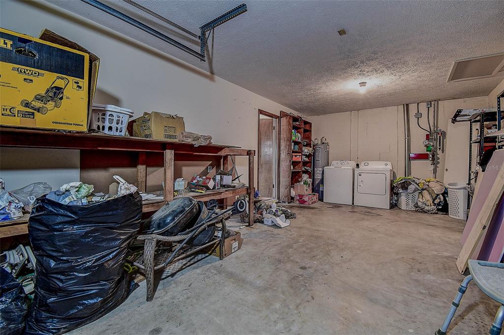 11425 Sun Road Dade City, FL 33525 - Photo 29 of 41 a bedroom with furniture