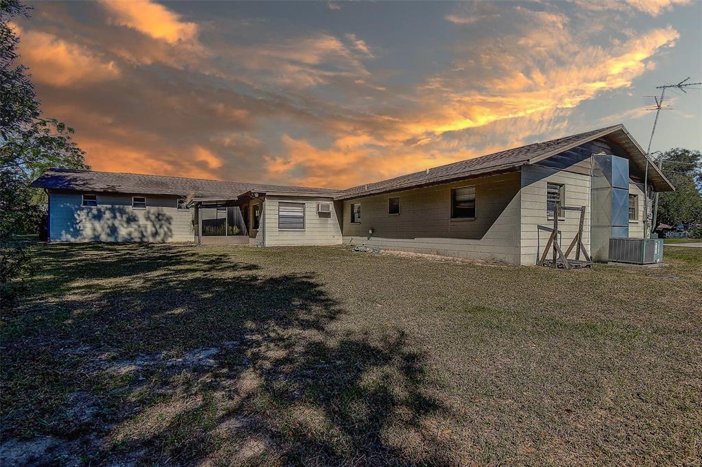 11425 Sun Road Dade City, FL 33525 - Photo 33 of 41 a view of a house with a yard