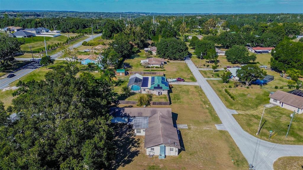11425 Sun Road Dade City, FL 33525 - Photo 38 of 41 an aerial view of a house with a garden