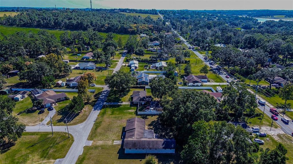 11425 Sun Road Dade City, FL 33525 - Photo 40 of 41 an aerial view of residential house with outdoor space and swimming pool