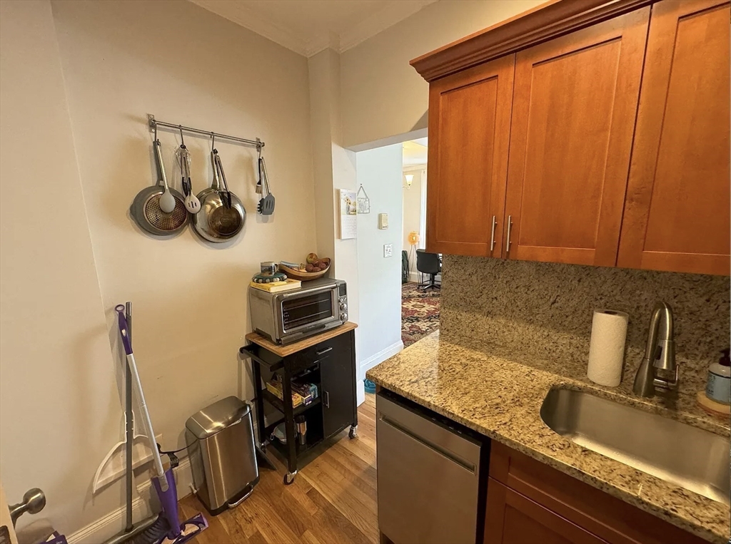 429 Marlborough Street, Unit 3A Boston, MA 02115 - Photo 9 of 21 a kitchen with a sink and cabinets