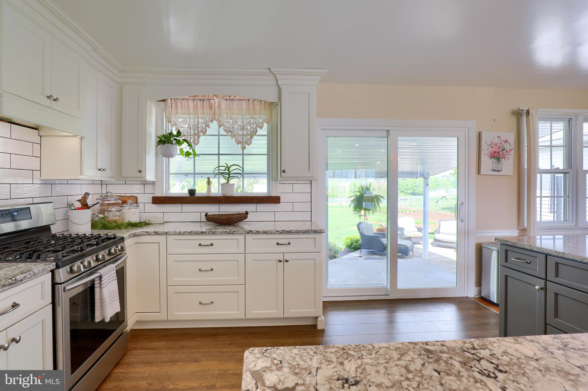 1913 Mine Road Paradise, PA 17562 - Photo 2 of 53 a kitchen with a stove a sink and a refrigerator