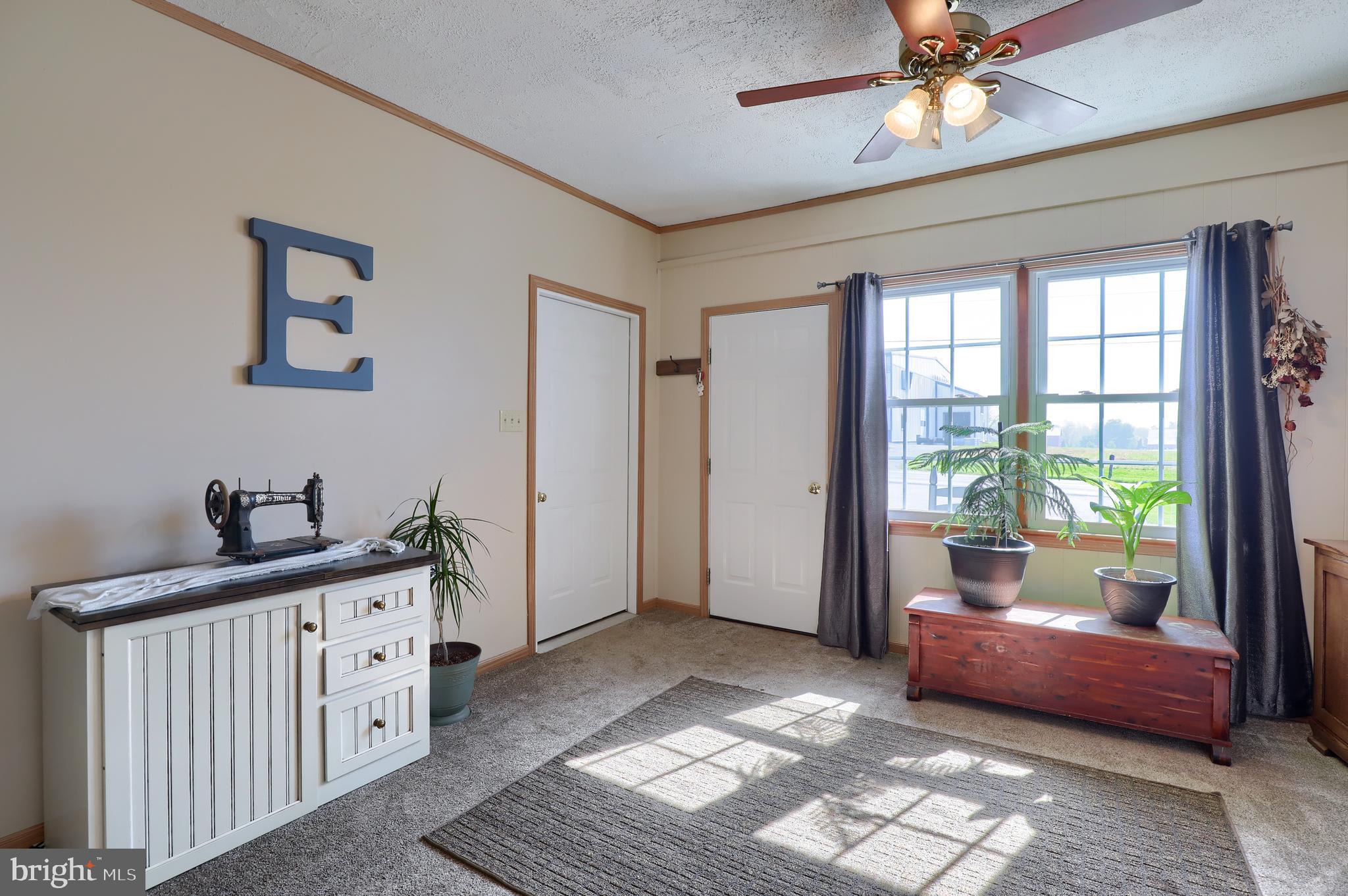 1913 Mine Road Paradise, PA 17562 - Photo 17 of 53 a living room with furniture and a window