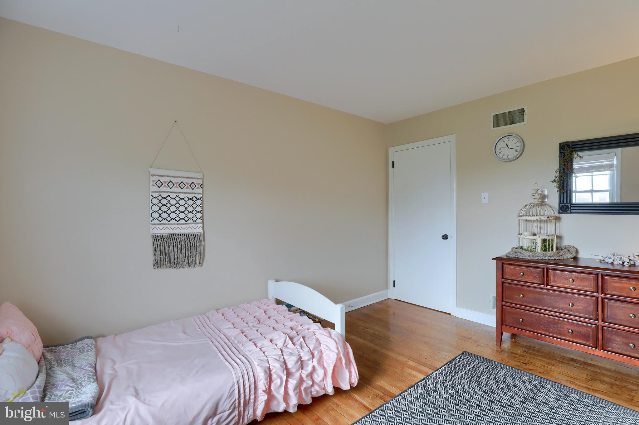 1913 Mine Road Paradise, PA 17562 - Photo 26 of 53 a bedroom with a bed and a dresser in it