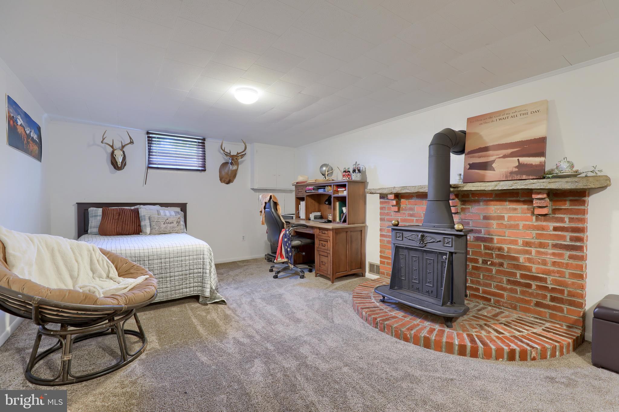1913 Mine Road Paradise, PA 17562 - Photo 31 of 53 a living room with furniture and a fireplace
