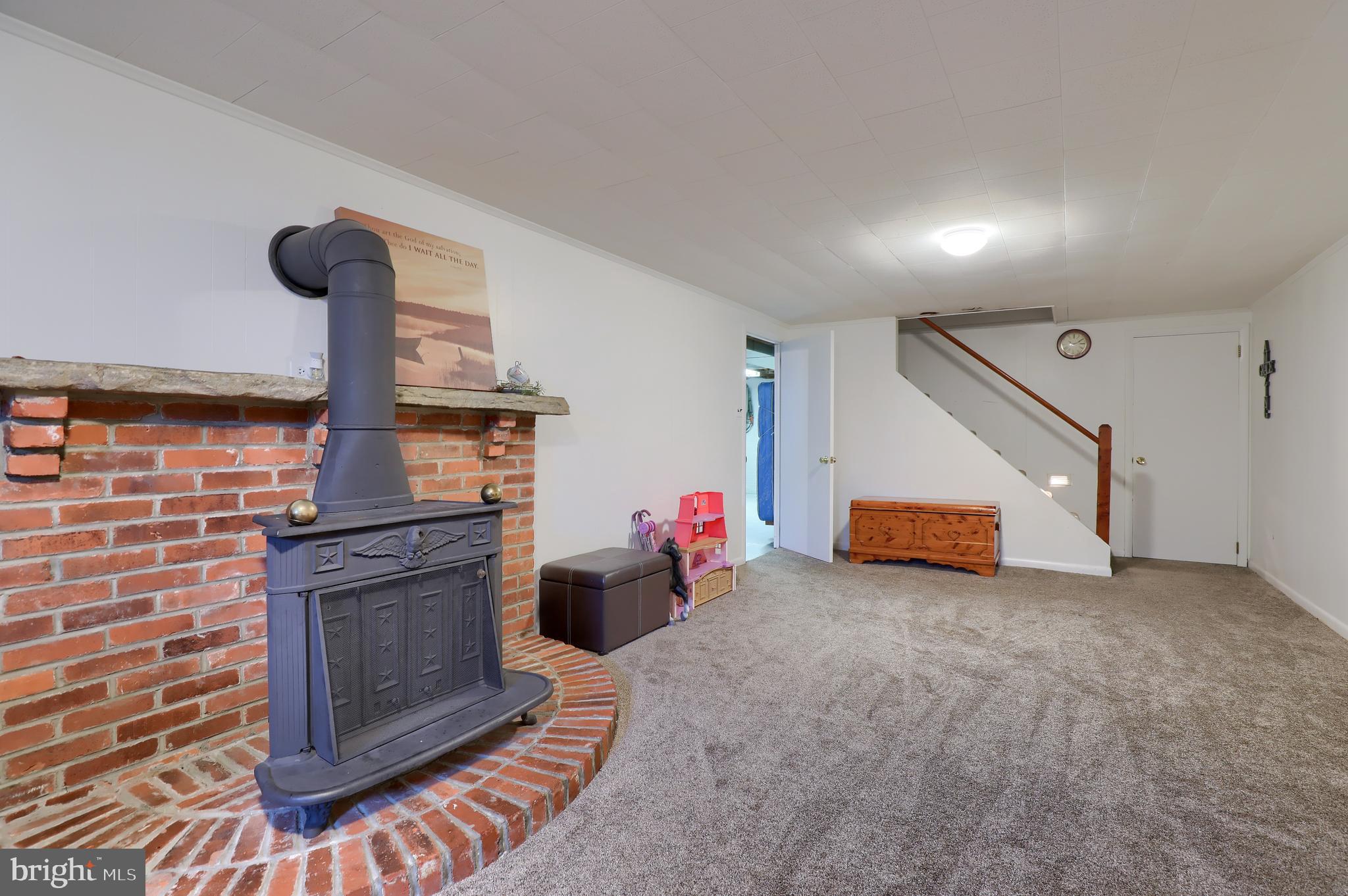 1913 Mine Road Paradise, PA 17562 - Photo 32 of 53 a view of a livingroom with wooden floor and staircase