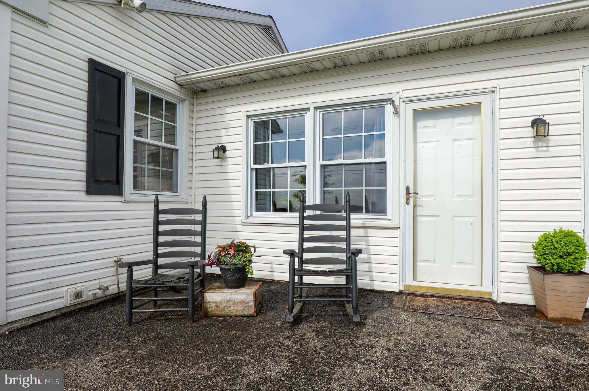 1913 Mine Road Paradise, PA 17562 - Photo 38 of 53 a view of a house with a backyard and a chair