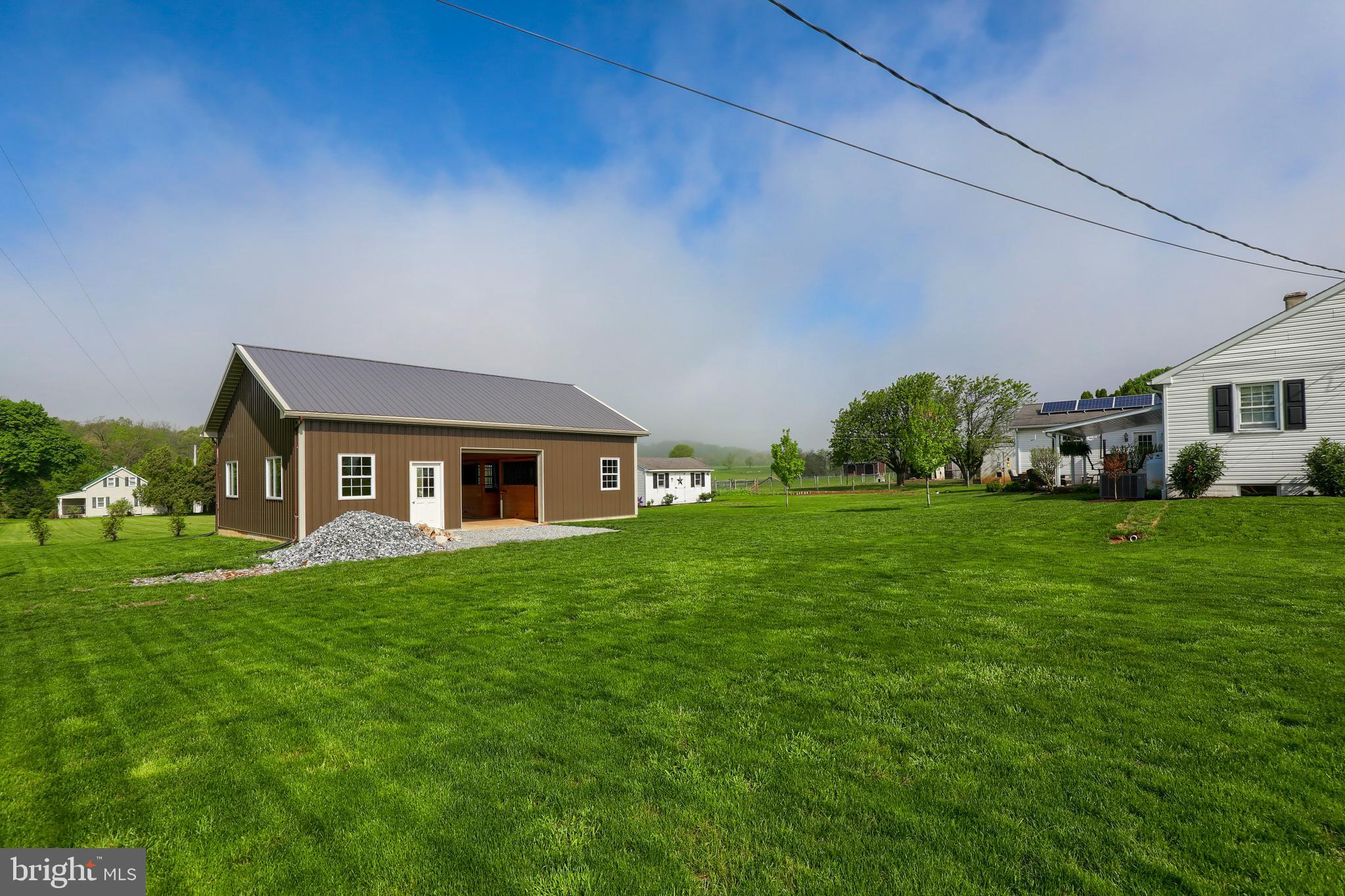 1913 Mine Road Paradise, PA 17562 - Photo 41 of 53 a front view of house with yard and green space