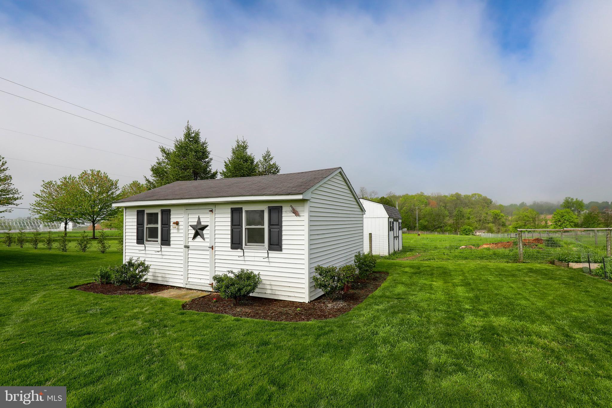 1913 Mine Road Paradise, PA 17562 - Photo 48 of 53 a front view of house with yard and green space