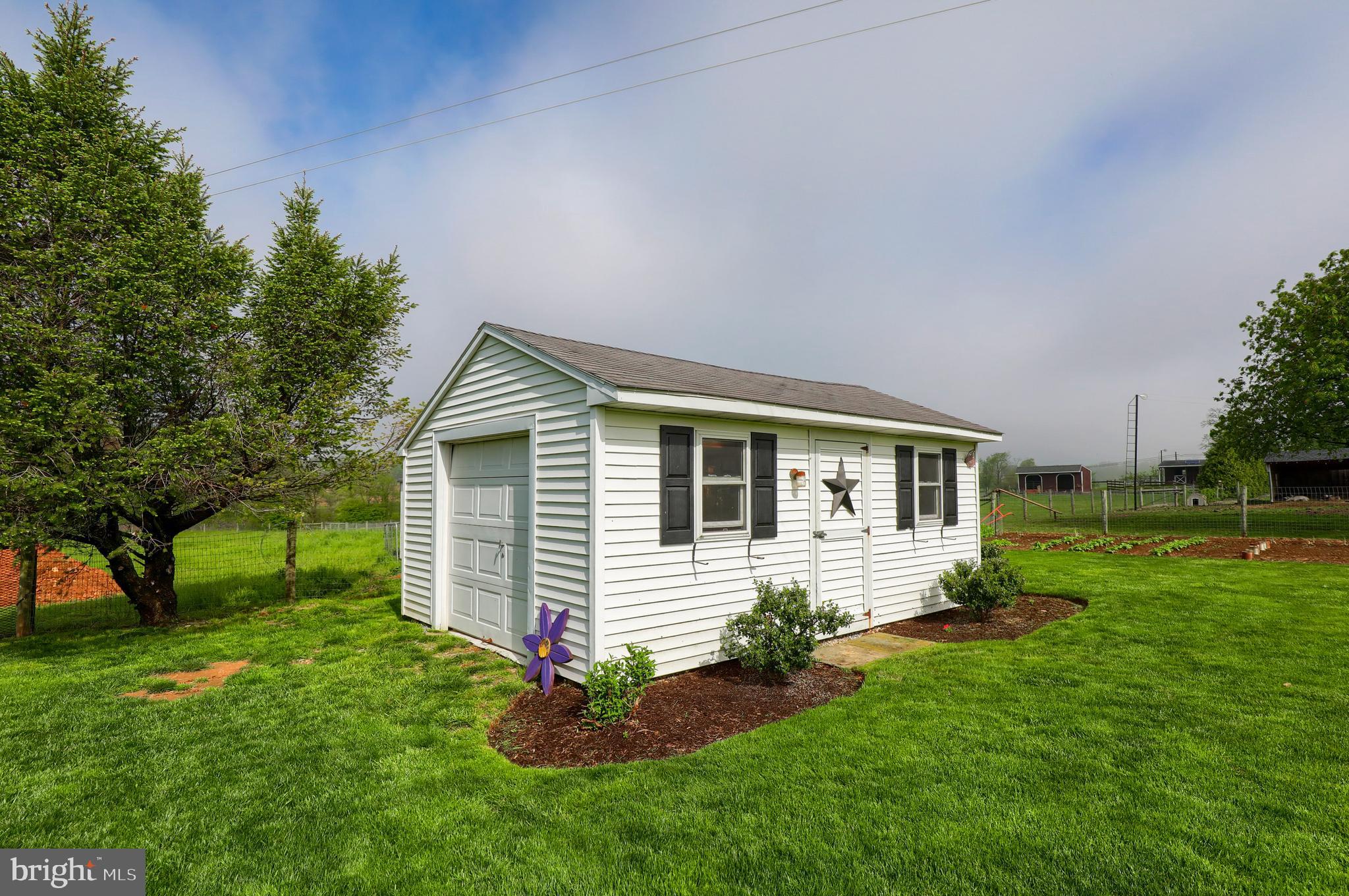 1913 Mine Road Paradise, PA 17562 - Photo 49 of 53 a front view of house with yard and green space