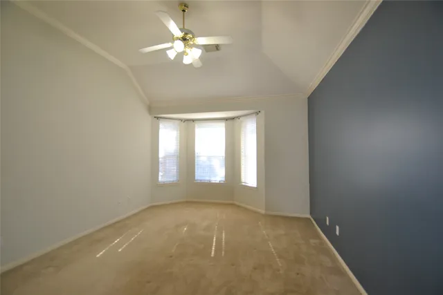 a large kitchen with a stove a sink dishwasher and a refrigerator