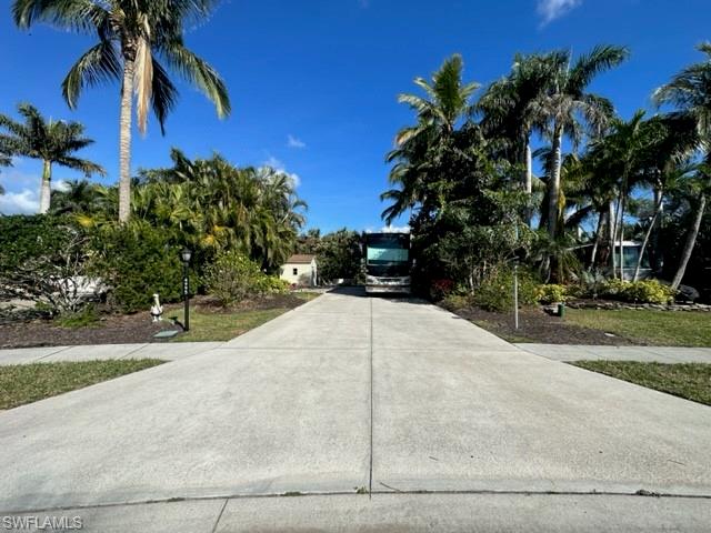 4995 Coach Lane Naples, FL 34114 - Photo 3 of 4 a view of a backyard