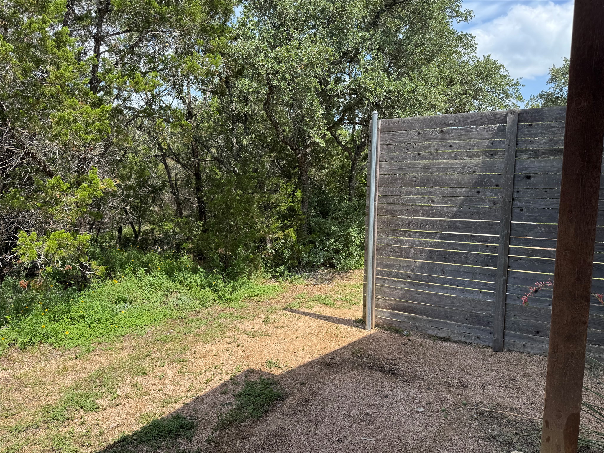 290 Hugo Road, Unit B San Marcos, TX 78666 - Photo 20 of 22 a view of a backyard of the house