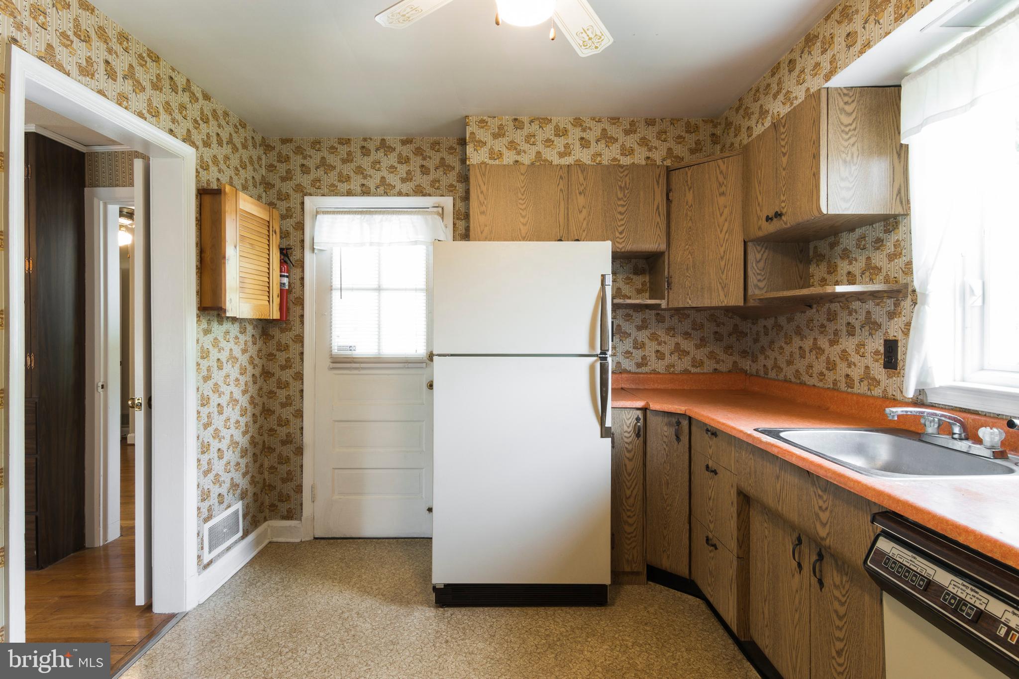 409 Waveland Road Baltimore, MD 21228 - Photo 13 of 38 Or SO many possibilities with this roomy kitchen