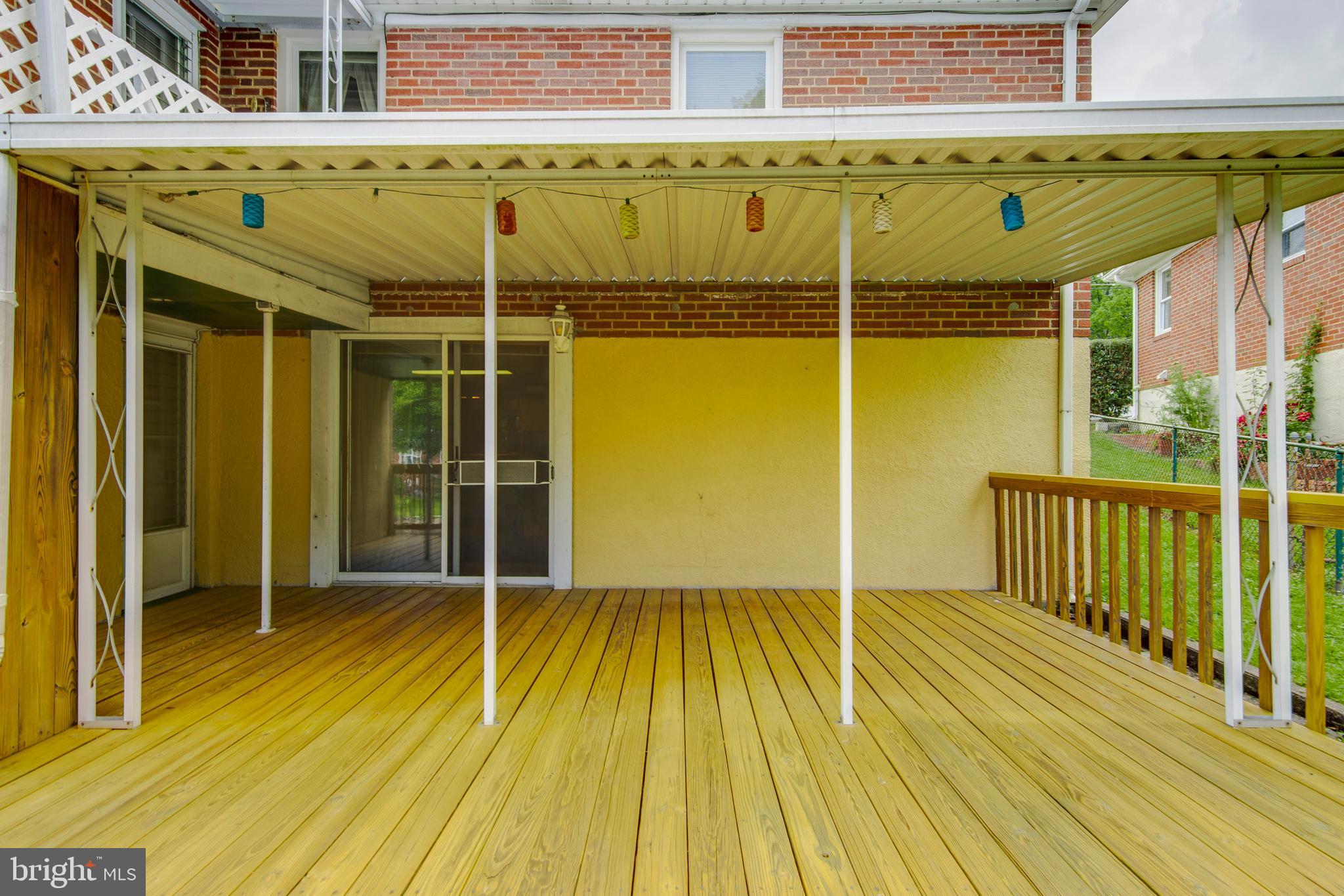 409 Waveland Road Baltimore, MD 21228 - Photo 34 of 38 Rear partially covered deck