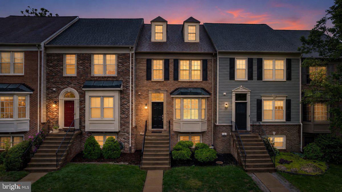 43576 Blacksmith Square Ashburn, VA 20147 - Photo 1 of 1 a front view of a house with a yard