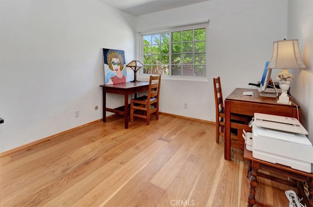 5821 Sierra Cielo Road Irvine, CA 92603 - Photo 19 of 26 a view of a workspace with furniture and a window