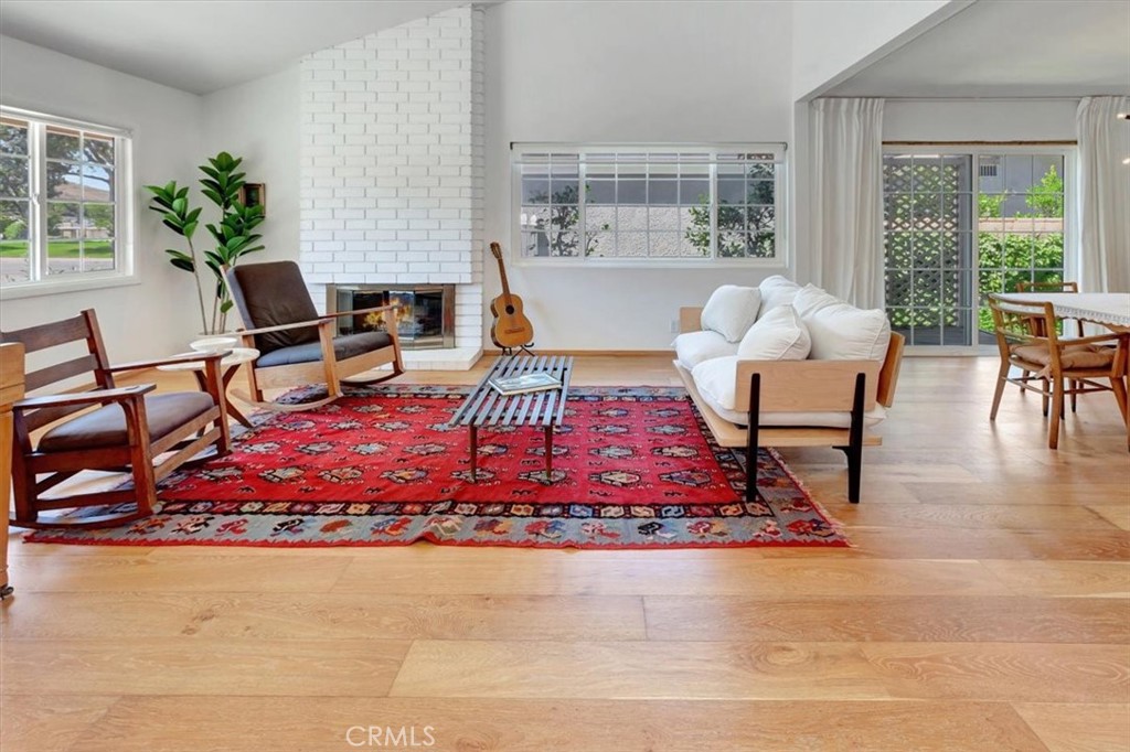 5821 Sierra Cielo Road Irvine, CA 92603 - Photo 2 of 26 a living room with furniture and a rug