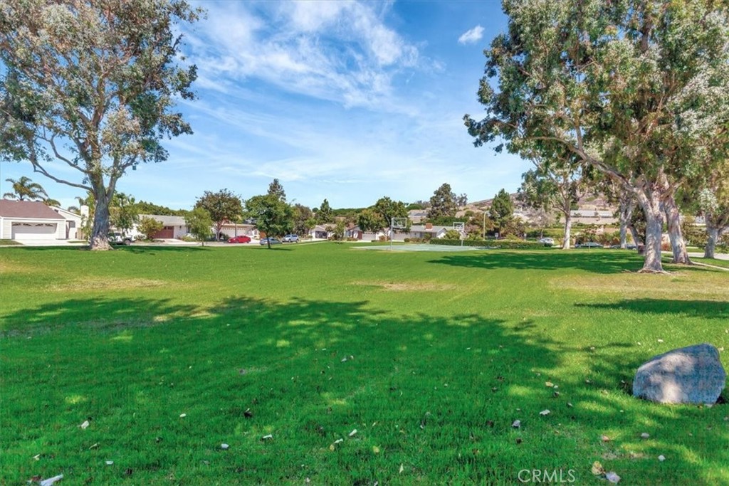 5821 Sierra Cielo Road Irvine, CA 92603 - Photo 26 of 26 a view of a field of grass and trees