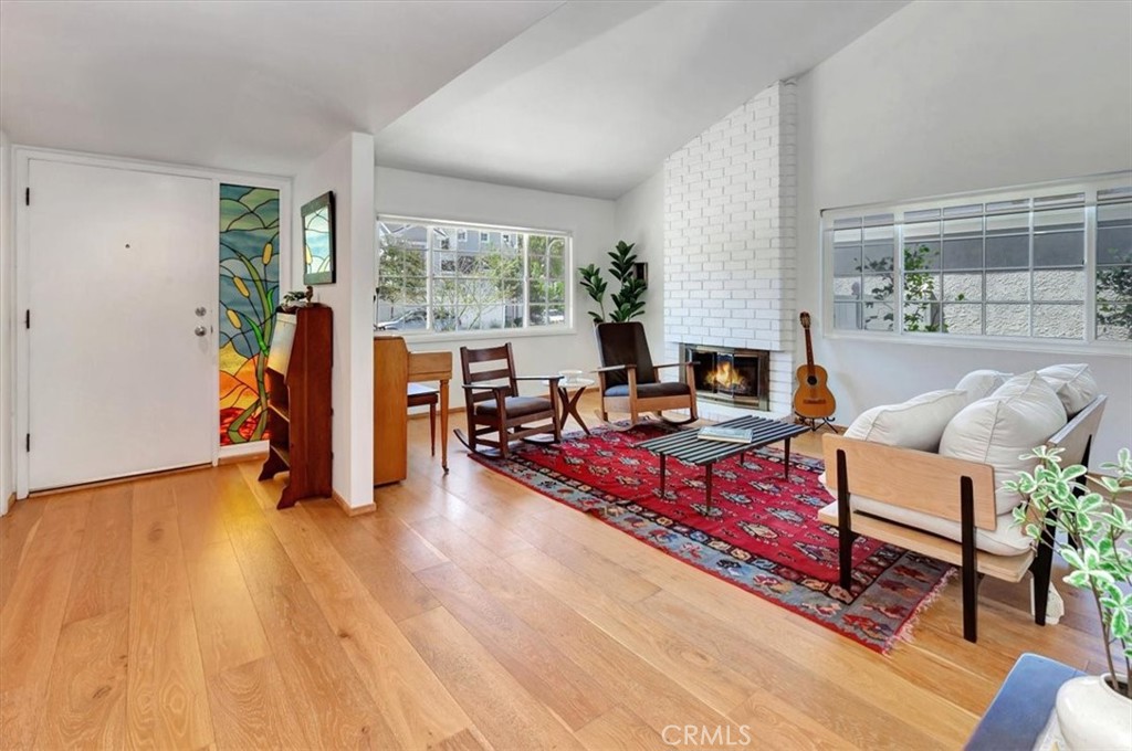 5821 Sierra Cielo Road Irvine, CA 92603 - Photo 7 of 26 a living room with furniture and a wooden floor
