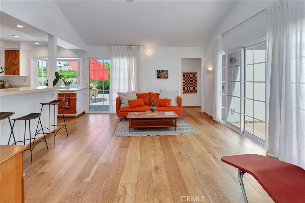 5821 Sierra Cielo Road Irvine, CA 92603 - Photo 10 of 26 a living room with furniture and a wooden floor