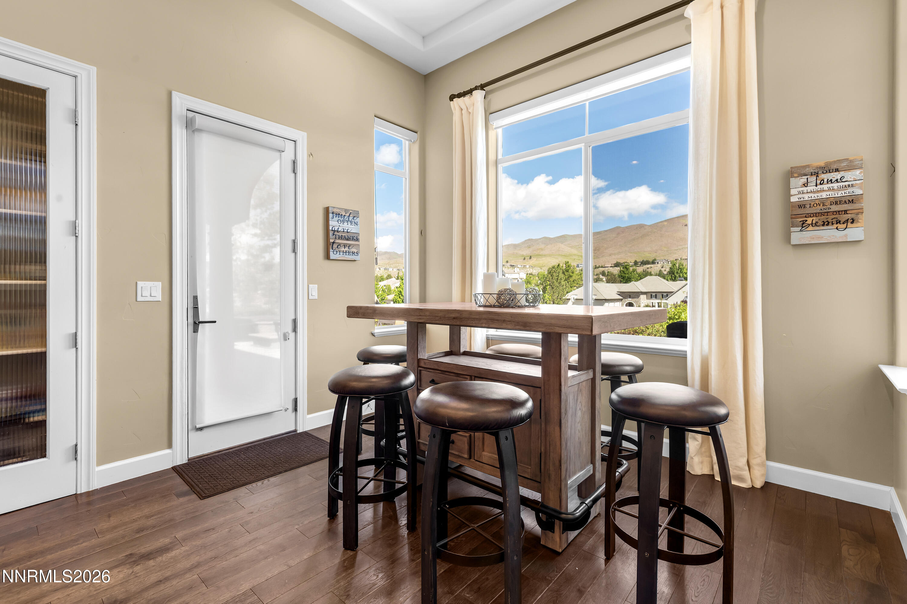 1898 Laurel Ridge Drive Reno, NV 89523 - Photo 25 of 87 a view of a dining room with furniture window and wooden floor
