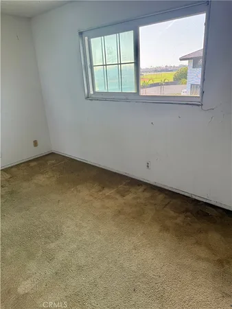 an empty room with window