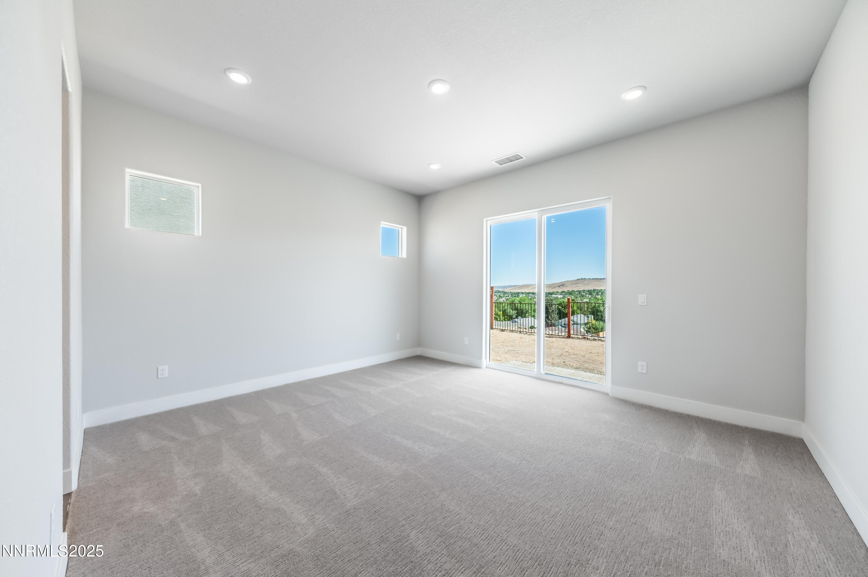 1357 Silver View Circle Sparks, NV 89436 - Photo 19 of 44 a view of an empty room with a window