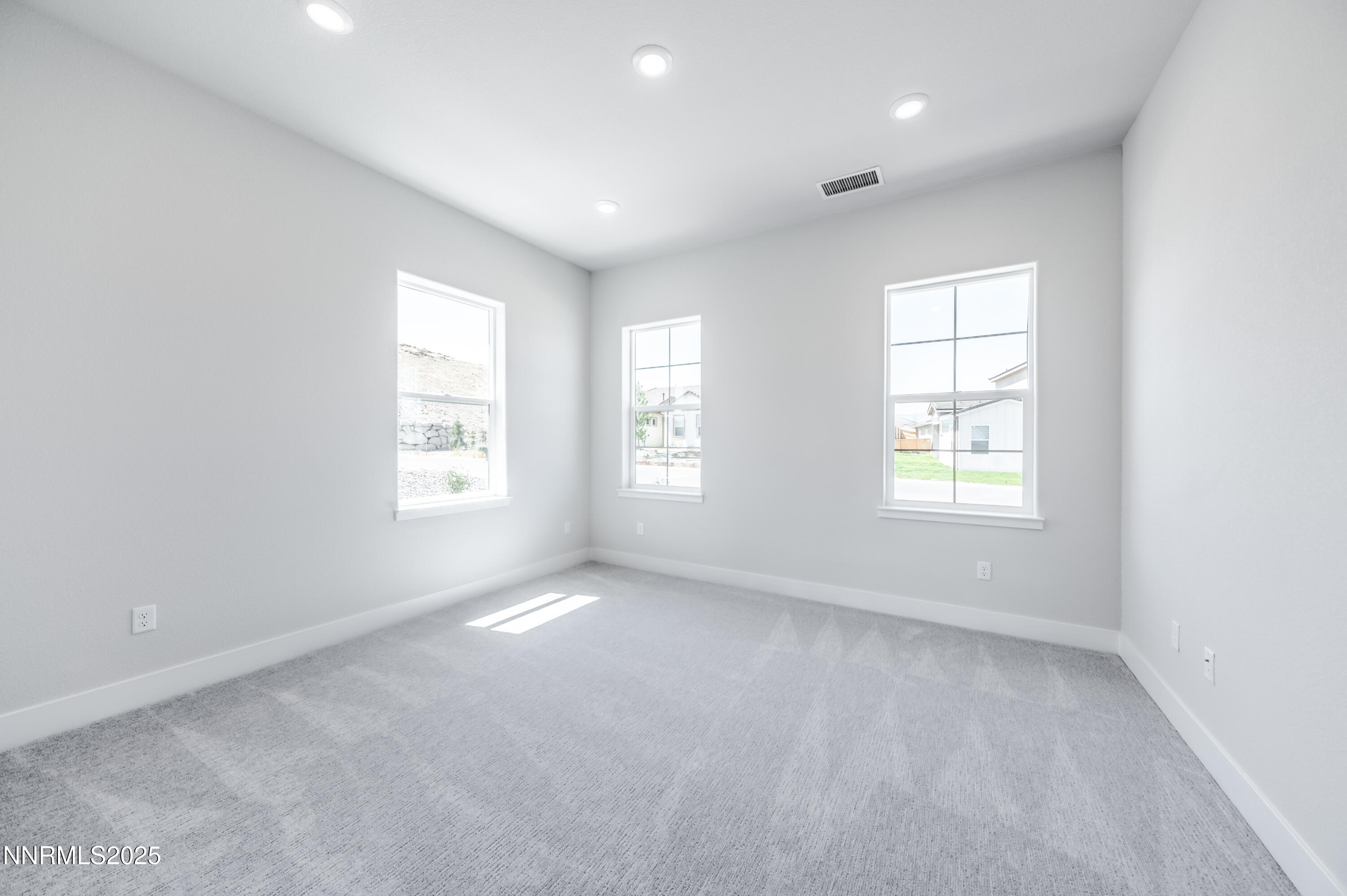 1357 Silver View Circle Sparks, NV 89436 - Photo 24 of 44 an empty room with windows