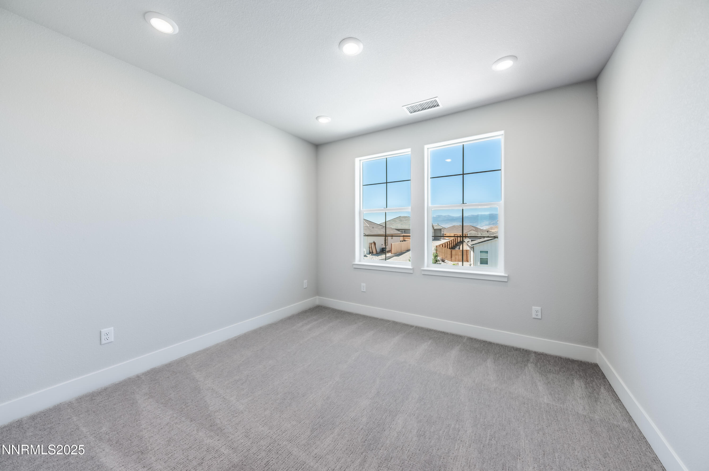 1357 Silver View Circle Sparks, NV 89436 - Photo 26 of 44 an empty room with windows