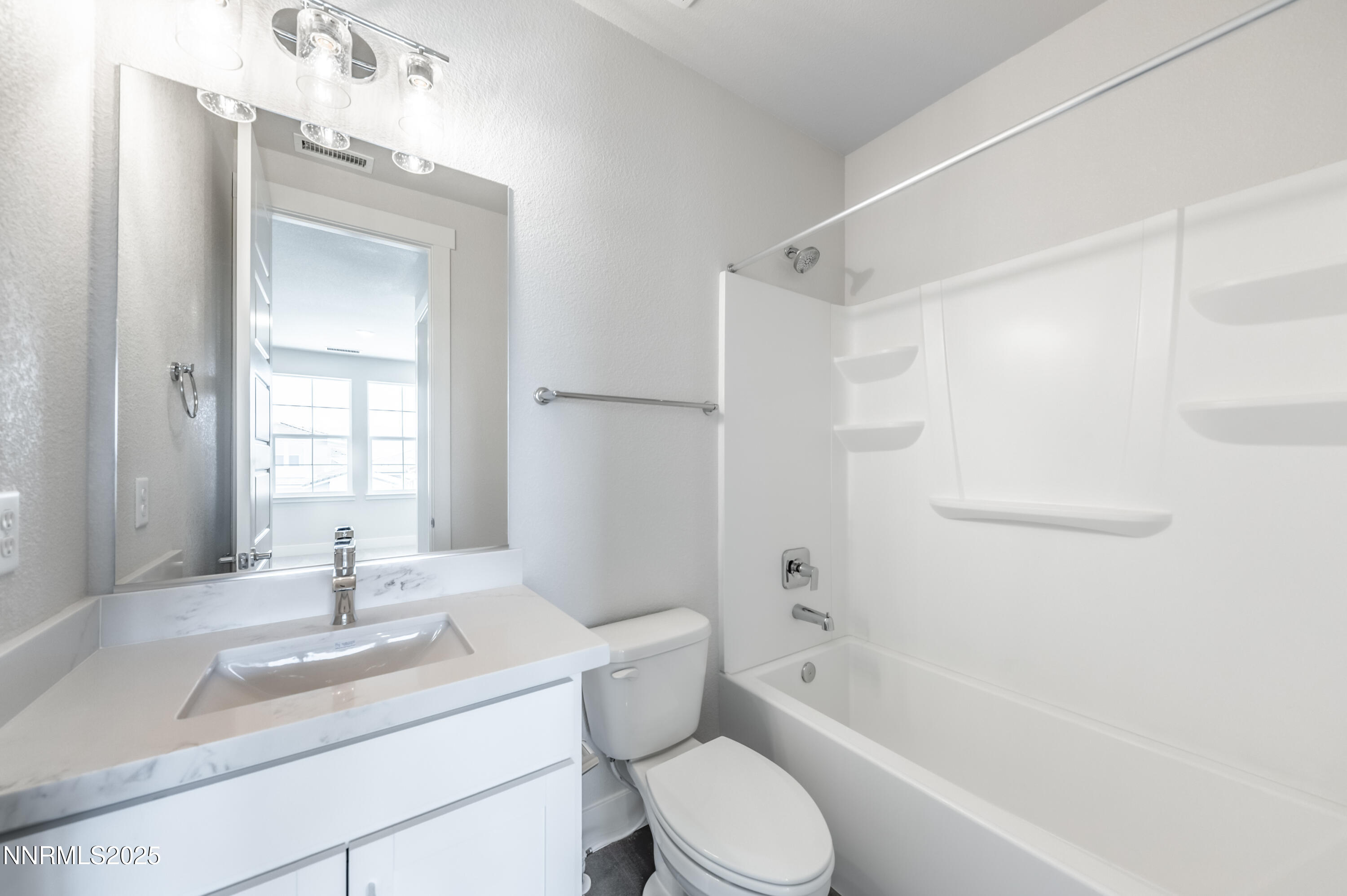 1357 Silver View Circle Sparks, NV 89436 - Photo 32 of 44 a bathroom with a sink a toilet and shower