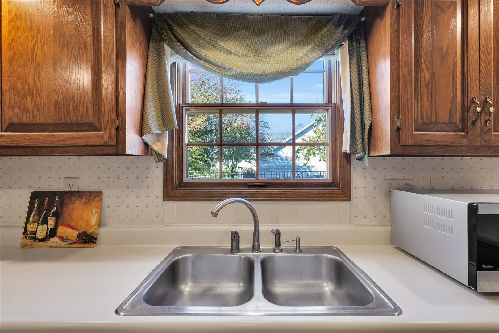 2011 O Donnell Drive Champaign, IL 61821 - Photo 16 of 43 a kitchen with a sink and a window