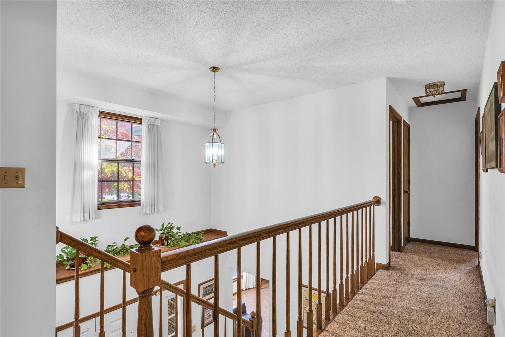 2011 O Donnell Drive Champaign, IL 61821 - Photo 28 of 43 a view of a hallway to a livingroom with furniture