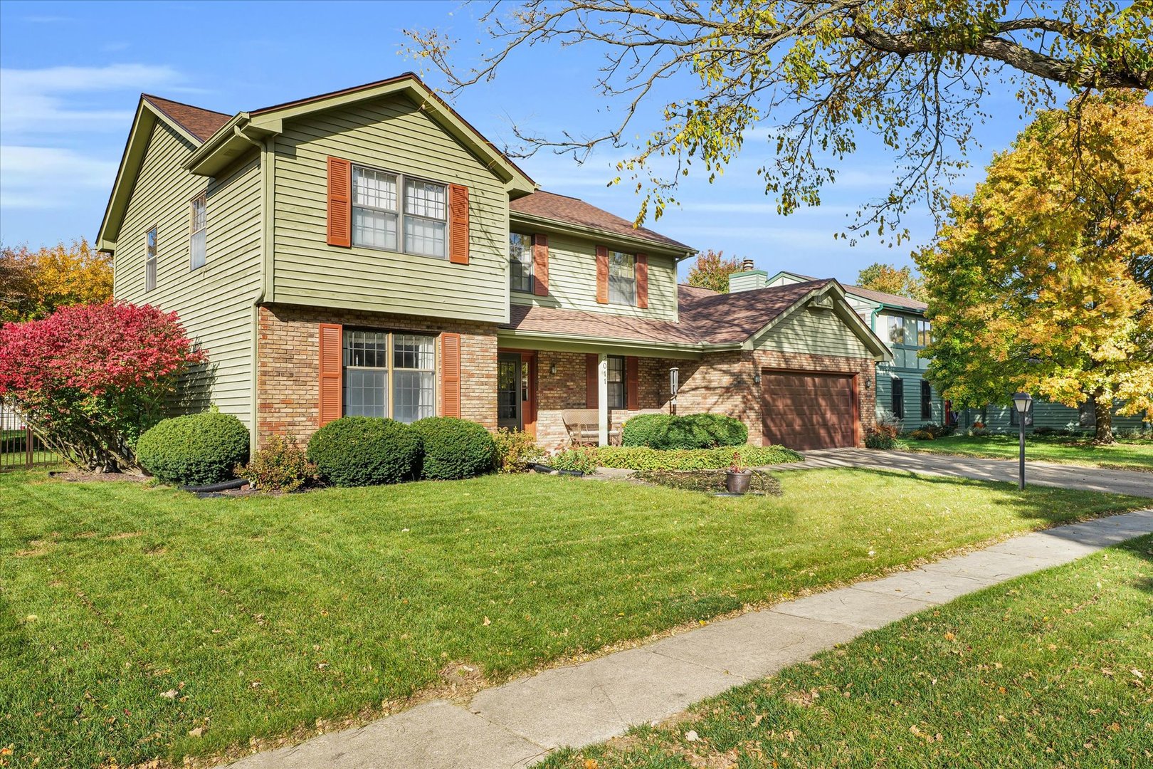 2011 O Donnell Drive Champaign, IL 61821 - Photo 3 of 43 a front view of a house with a yard